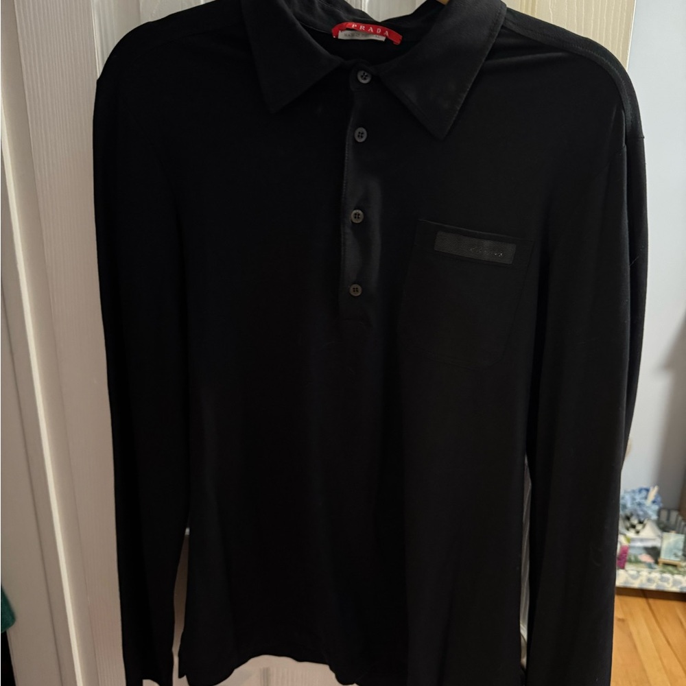 NWOT, Prada Women’s Black long sleeve polo shirt. Worn once. Size medium.